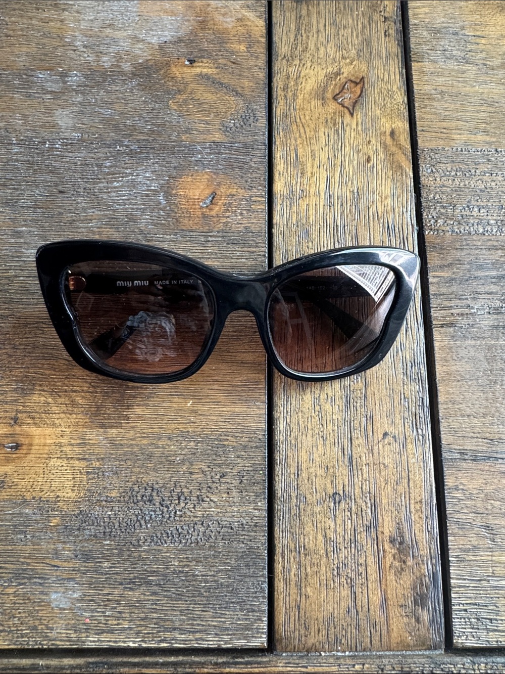 Miu Miu Black Cat-Eye Sunglasses with Brown Lenses